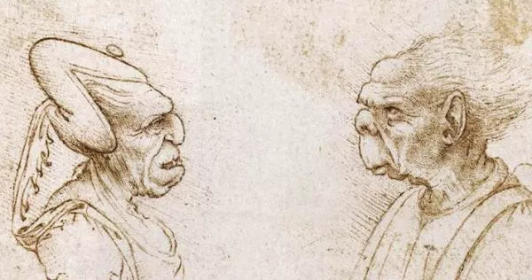 Two Grotesque Heads