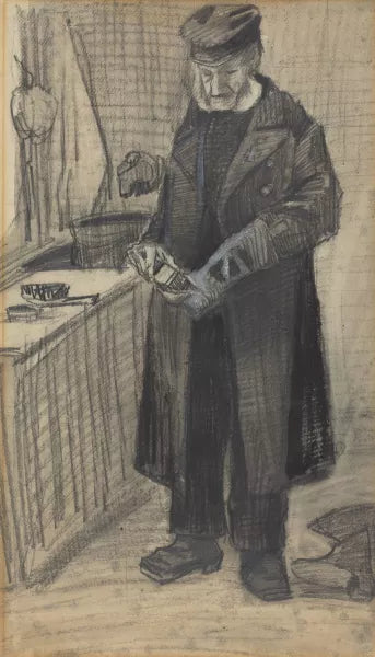 Man Polishing A Boot